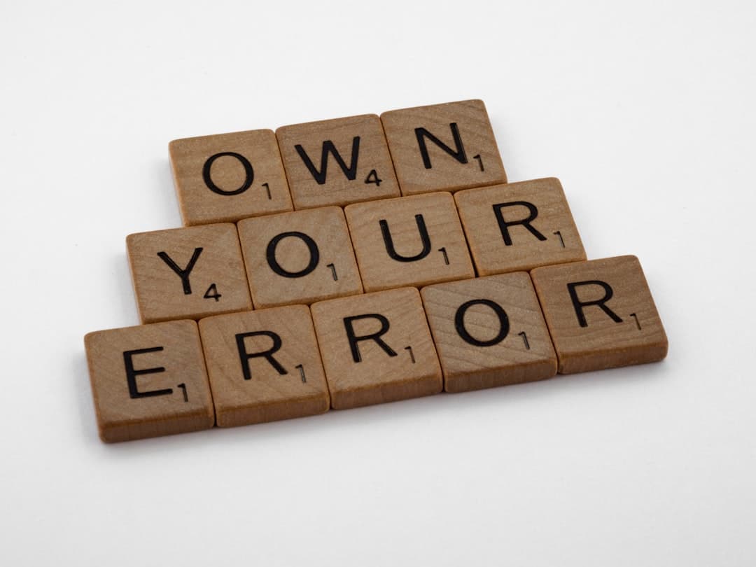 A form field error shown with a red border, warning icon and text label together